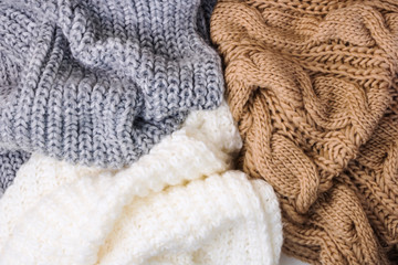 Fototapeta na wymiar Warm knitted sweaters. autumn concept. Copy space. Women clothing.