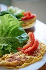 Omlette with salad and paprika on breafast