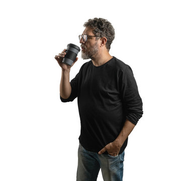 Portrait Of A 48 Years Old Bearded Adult Man Drinking Coffee Or Tea (hot Drinks) From A Take Away Cup. Studio Shot, Isolated On A White Background.