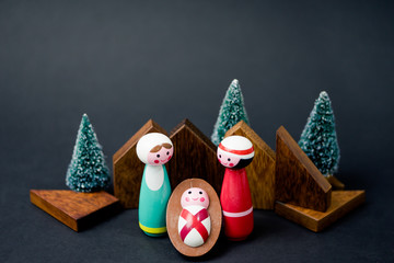 Christmas nativity scene of born child baby Jesus Christ in the manger with Joseph and Mary.Traditional Christmas Nativity Scene of baby Jesus in the manger with Mary and Joseph.