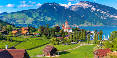 Aerial panoramic view of Spiez Church and Castle on the shore of Lake Thun in the Swiss canton of...