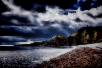 Coastline at Berriedale under dark clouds