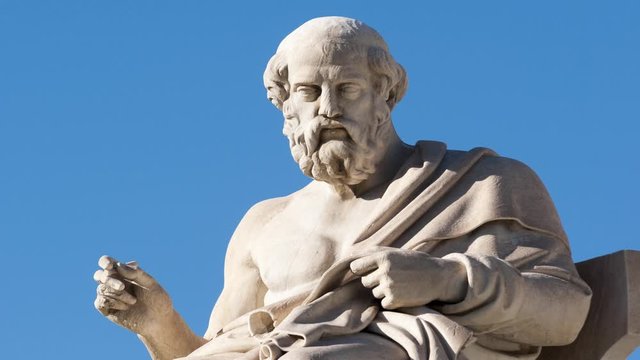 classic statue of Greek philosopher Plato sitting