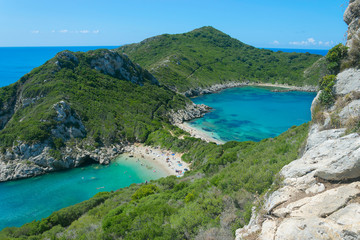 Azure crystal clear sea in Porto Timoni double beach in Corfu near village Agios Georgios Pagon. Beautiful twin Greek famous beach.