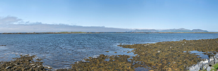 cliffs in water and gulf landscape, Nordmela , Norway