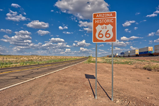Road sign marking Historic Route 66 just east of Seligman AZ, which is the birth place of the famous road.