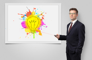 Fototapeta premium Man with laser pointer presenting innovative idea