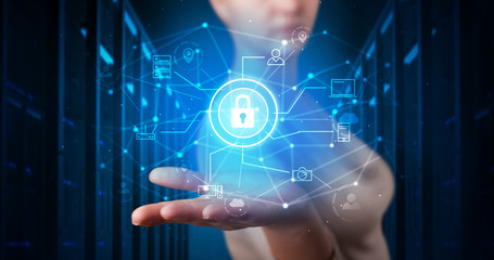 Woman holding hologram projection displaying cloud technology symbols