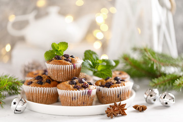 Blueberry muffins with fresh berries and Christmas, Xmas or New Year decorations