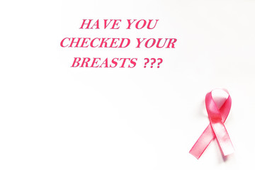 October is breast cancer awareness month, a woman holds a pink ribbon to support people living and sick. Health, international women's day and the concept of the world day of fight against cancer