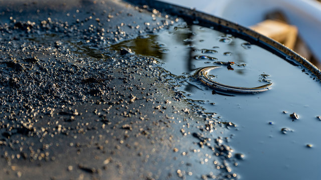 barrel with oil at surface