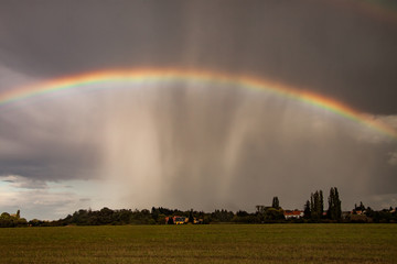 rainbow over village