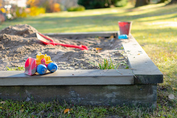 colorful toys at a sandpit at playground
