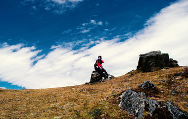 hiker on the top of mountain