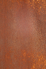 Old rusty metal leaf of brown color with orange spots