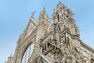 Detail of facade of the cathedral of Siena with Sienese wolf