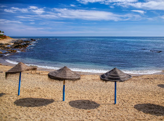 umbrellas by the sea a peaceful afternoon