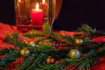 Christmas pictures, view of fir branches, candles, lanterns and Christmas decorations