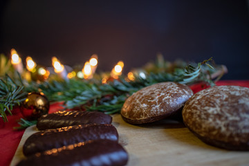 Christmas pictures, view of Christmas cookies with fir branches, candles and Christmas decorations
