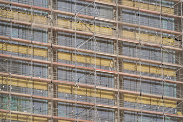 construction of a new building, crane, construction, work of people. new housing or offices.