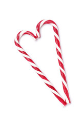 Tasty red candy cane  on white background. Festive treat