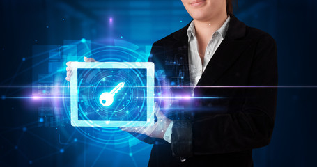 Hand holding tablet with online security and data protection concept