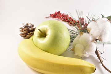 Apple and banana on a white background 