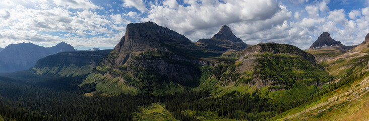 Obraz premium Glacier National Park, Montana, United States. Beautiful Panoramic View of American Rocky Mountain Landscape during a Cloudy Summer Morning.
