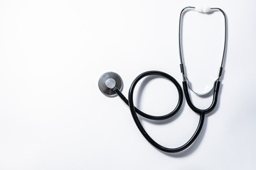 Medical stethoscope on white background with copy space for your text. Health care concept.