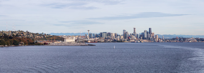Fototapeta na wymiar Downtown Seattle, Washington, United States of America. Beautiful Zoomed in View of the Modern City on the Pacific Ocean Coast during a sunny and cloudy Autumn Day.