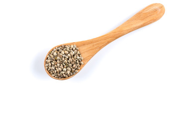 Cannabis Hemp seeds in spoon on white