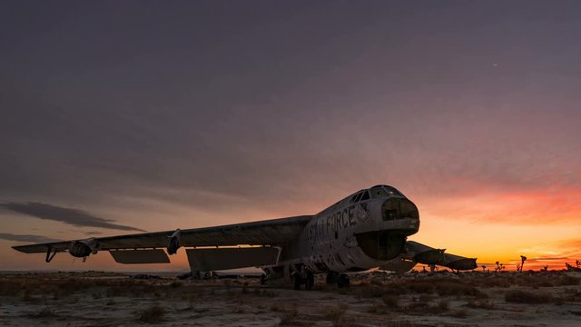 Timelapse of Sunrise Sky over Abandoned B-52 in Desert