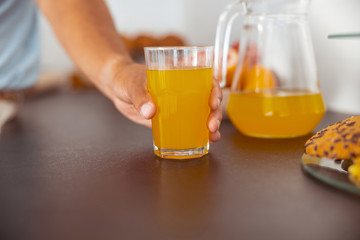 Close up of male hand that taking glass