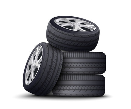 Realistic car wheel pile isolated on white background with black tires and metal rims