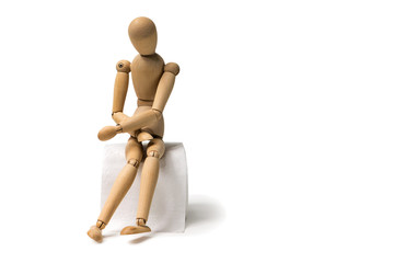figure of a man sitting on a roll of toilet paper holding his stomach, diarrhea, abdominal pain, food poisoning, intestinal infection