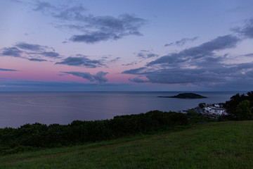 Fototapeta na wymiar Sunset over Looe Island in Whitsand bay Looe Cornwall