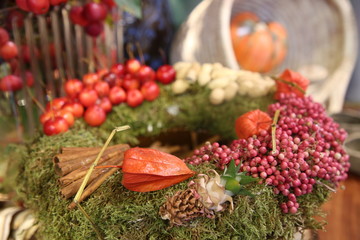 Decorative yellow pumpkin on wooden table.