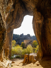View of the Templar hermitage of San Bartolome in the canyon del rio lobos natural park inside a cave, Soria, Spain