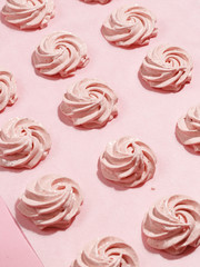 Handmade marshmallows before baking on parchment paper. cooking process