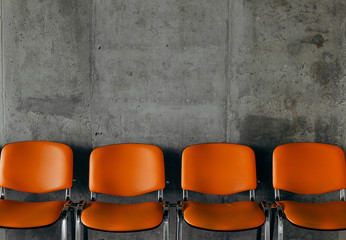 colored office chairs group arranged row guests