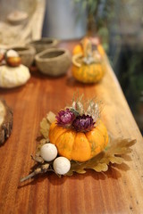 Obraz na płótnie Canvas Decorative colorful pumpkins on wooden table.