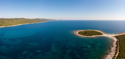 Spectacular aerial sea landscape of sandy beach and crystal clear water.