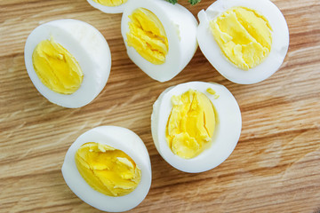 boiled eggs on a wooden background.