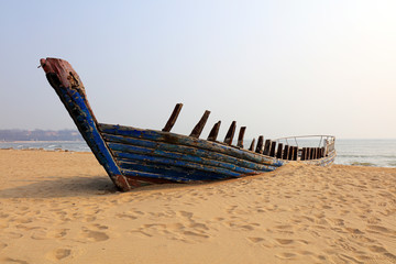 wrecked fishing boat on the beach