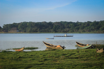 Lake Victoria in Uganda and an empty wooden poor fisherman boat.