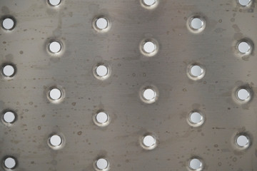 A steel plate with holes