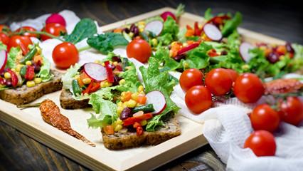 Healthy vegetarian meal (food), fresh organic vegetable on bread