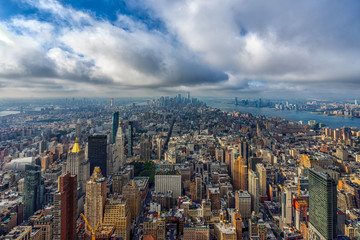 View Manhattan skyline with clouds from the top of Empire State building