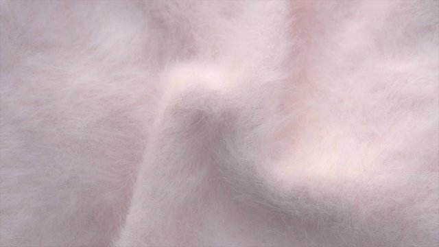 Natural cashmere soft and fluffy merino wool. Rotates. 