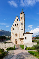 Fototapeta na wymiar Trento (Italy) - Sant'Apollinare romanic church in Trento, along the river Adige, northern Italy